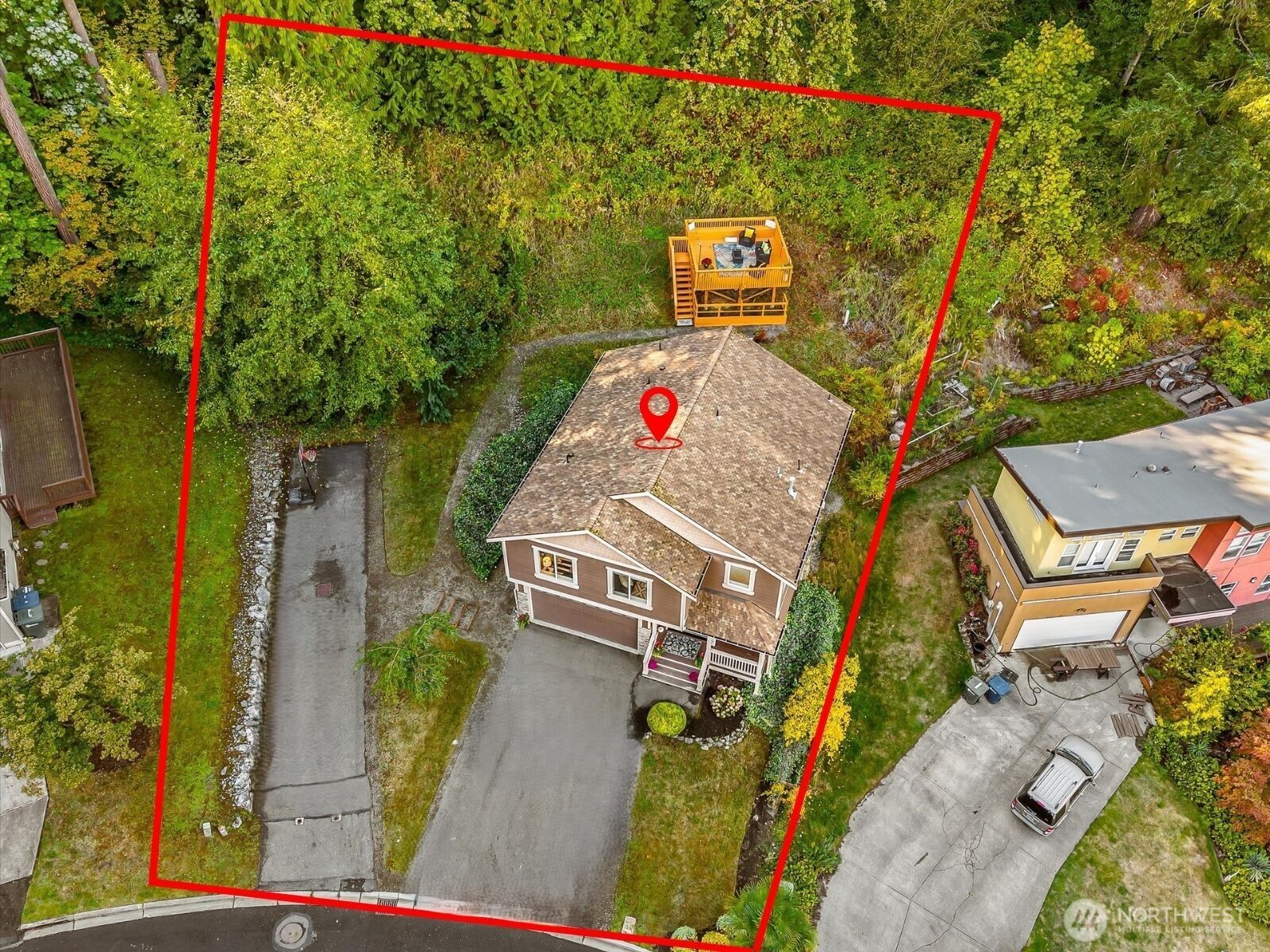 9213 Odin Way Bothell, WA 98011 - Photo 32 of 40 an aerial view of a house with a yard and garden