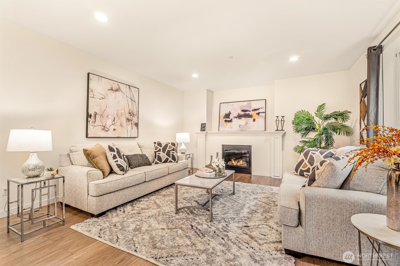 9213 Odin Way Bothell, WA 98011 - Photo 6 of 40 a living room with furniture and a fireplace