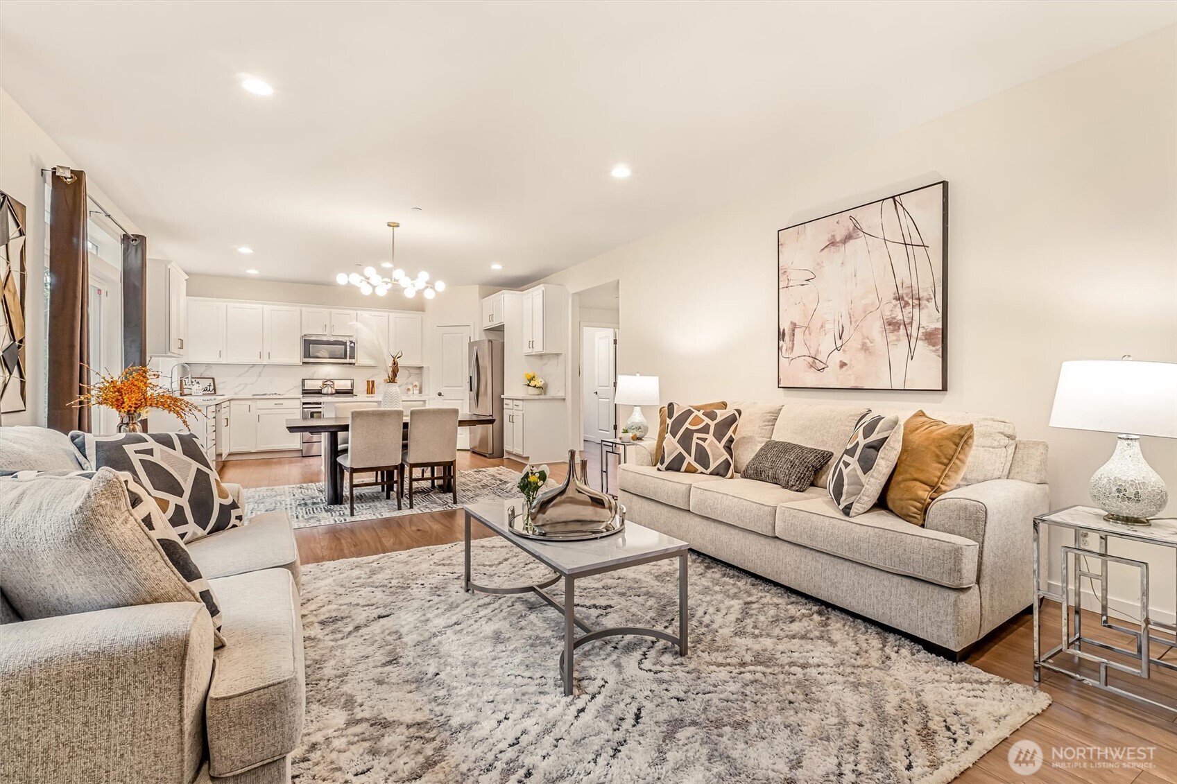 9213 Odin Way Bothell, WA 98011 - Photo 7 of 40 a living room with furniture and kitchen view