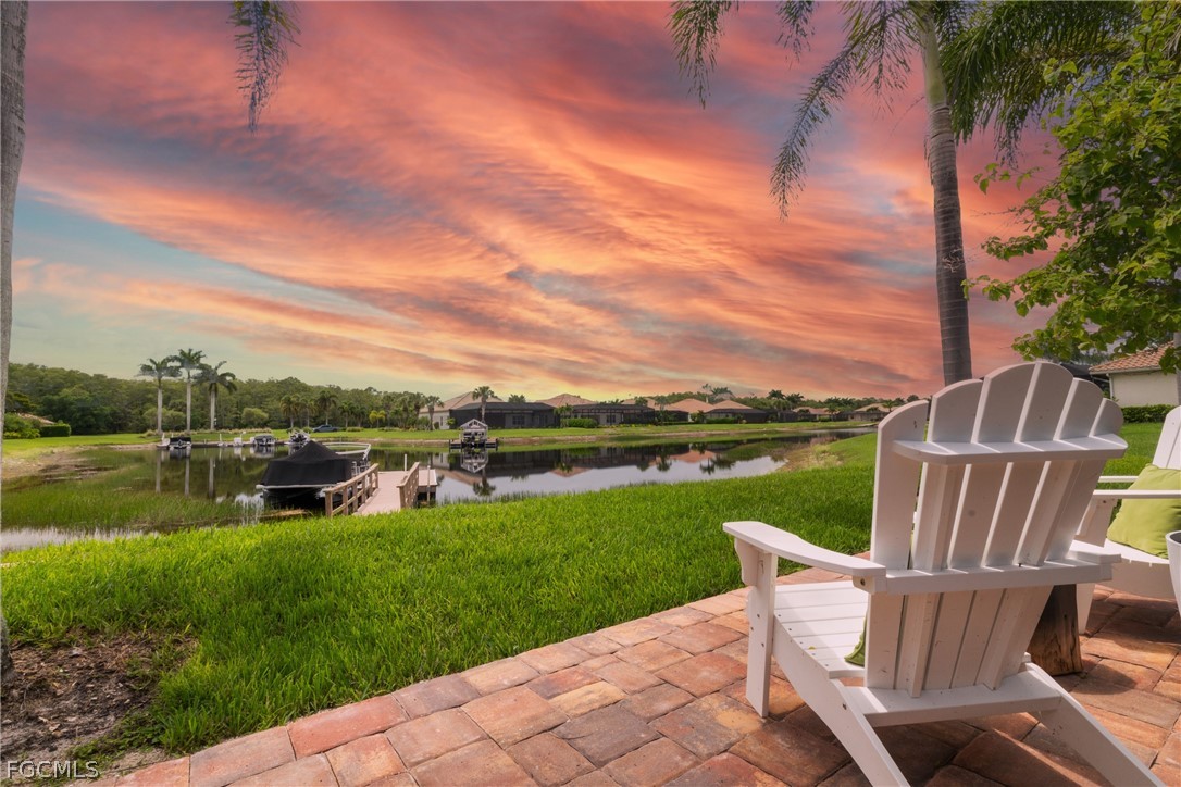 9383 Slate Court Naples, FL 34120 - Photo 24 of 28 a view of a chairs and table in the patio