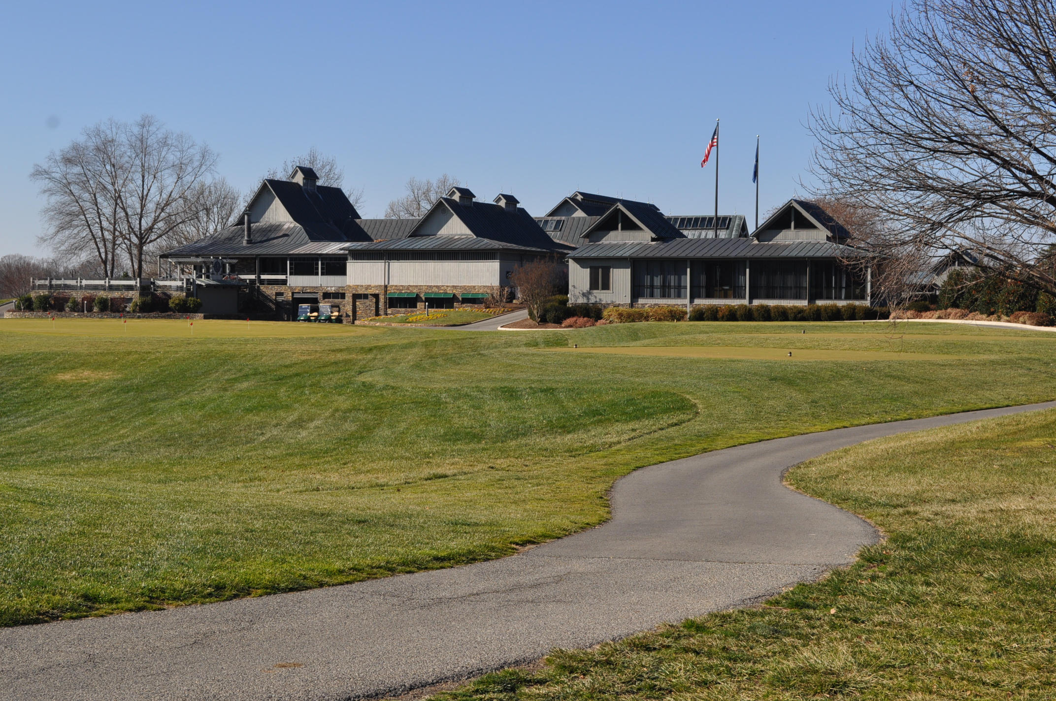 Lot 29 Waters Edge Drive Penhook, VA 24137 - Photo 4 of 11 a front view of a house with a garden