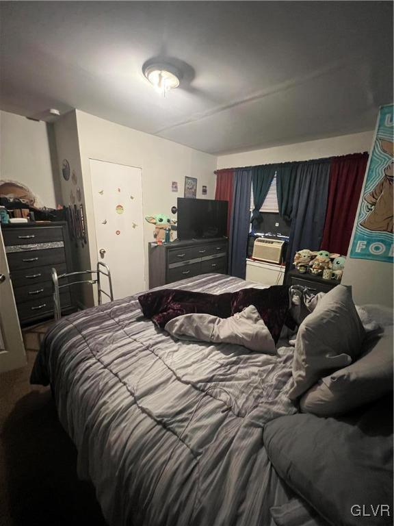524 Greenleaf Street Allentown, PA 18102 - Photo 12 of 26 a bedroom with a bed and a television