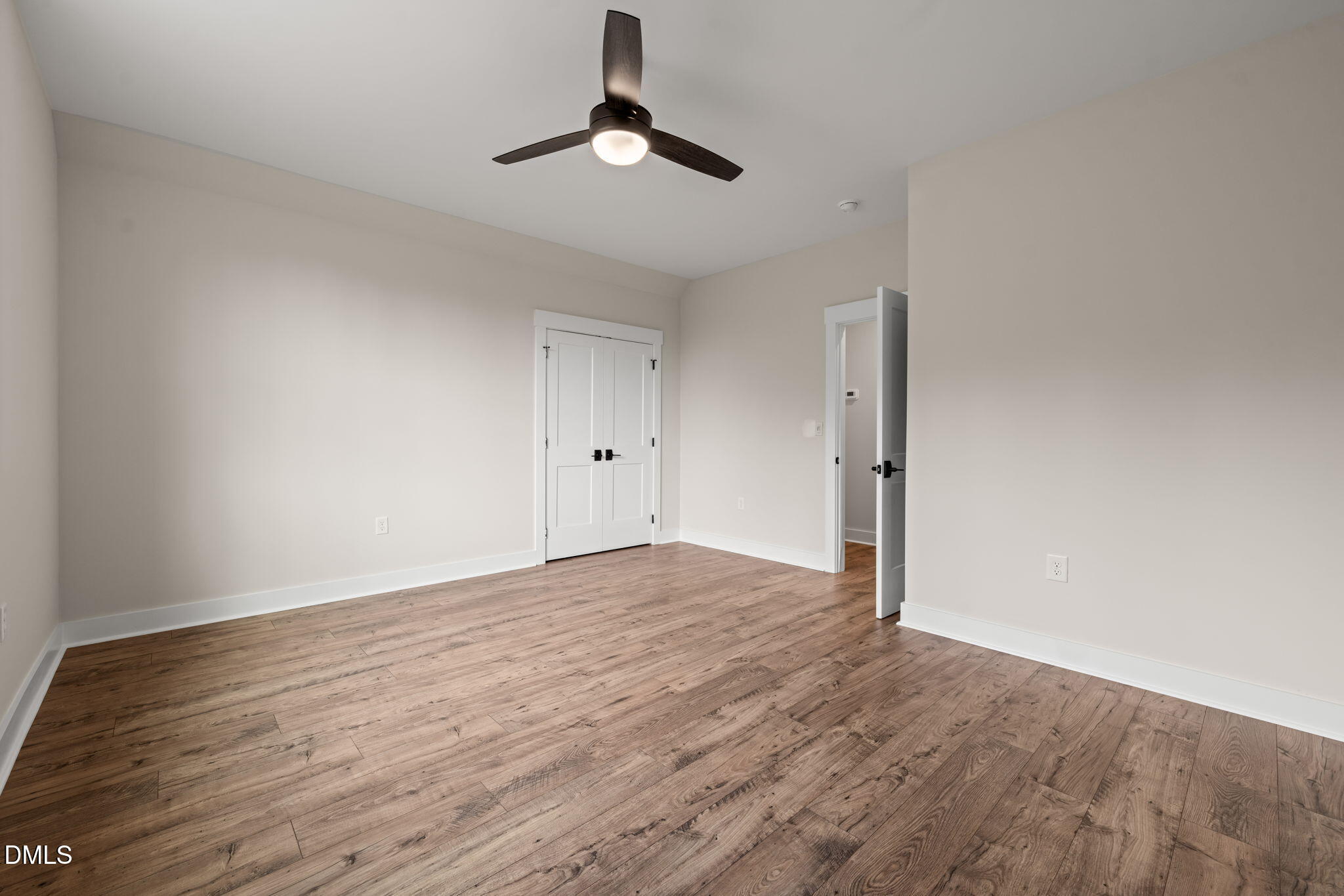 400 Pilot Ridge Road Zebulon, NC 27597 - Photo 35 of 51 a view of empty room with wooden floor