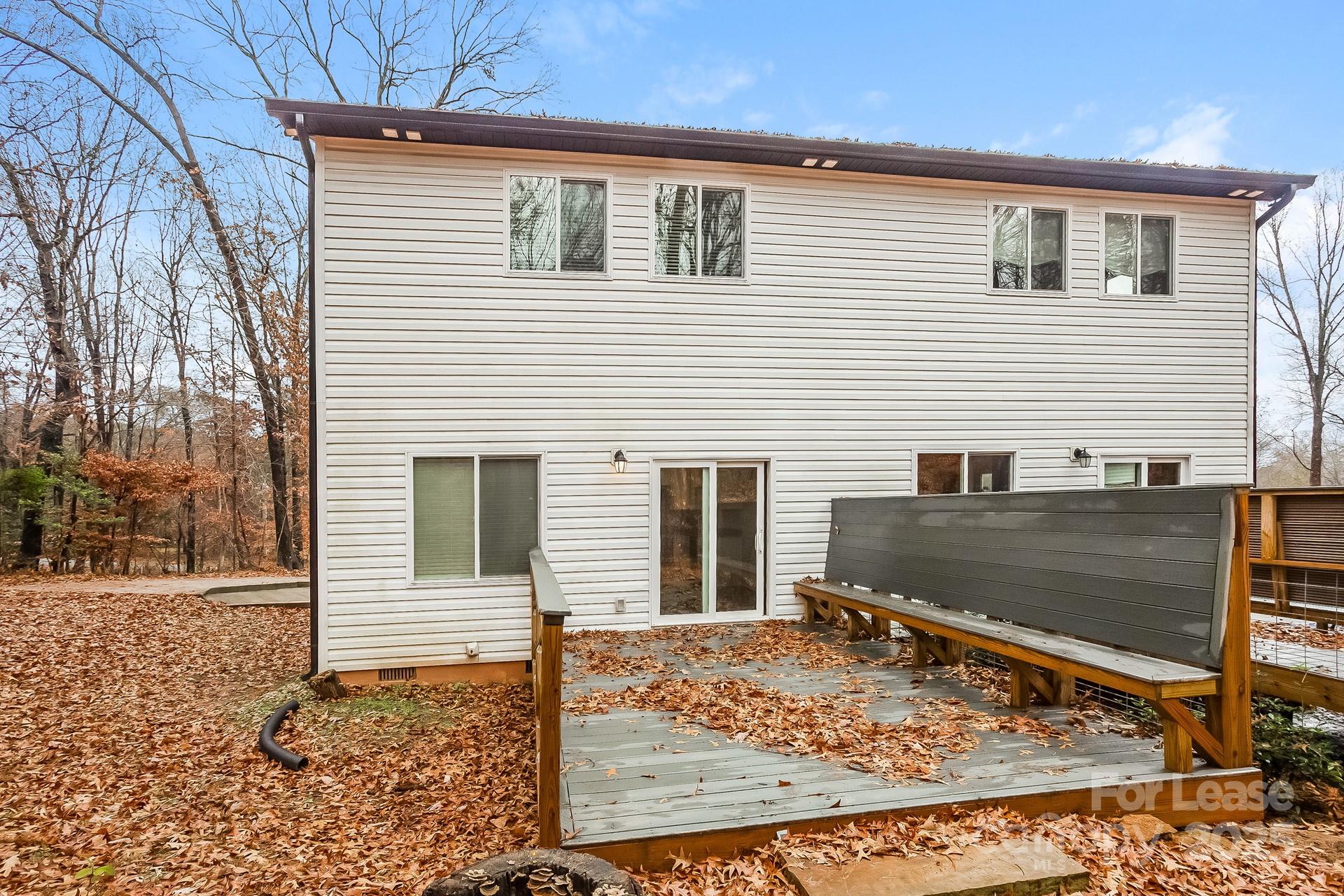 3987 Flat Rock Road Terrell, NC 28682 - Photo 17 of 17 a view of a house with backyard