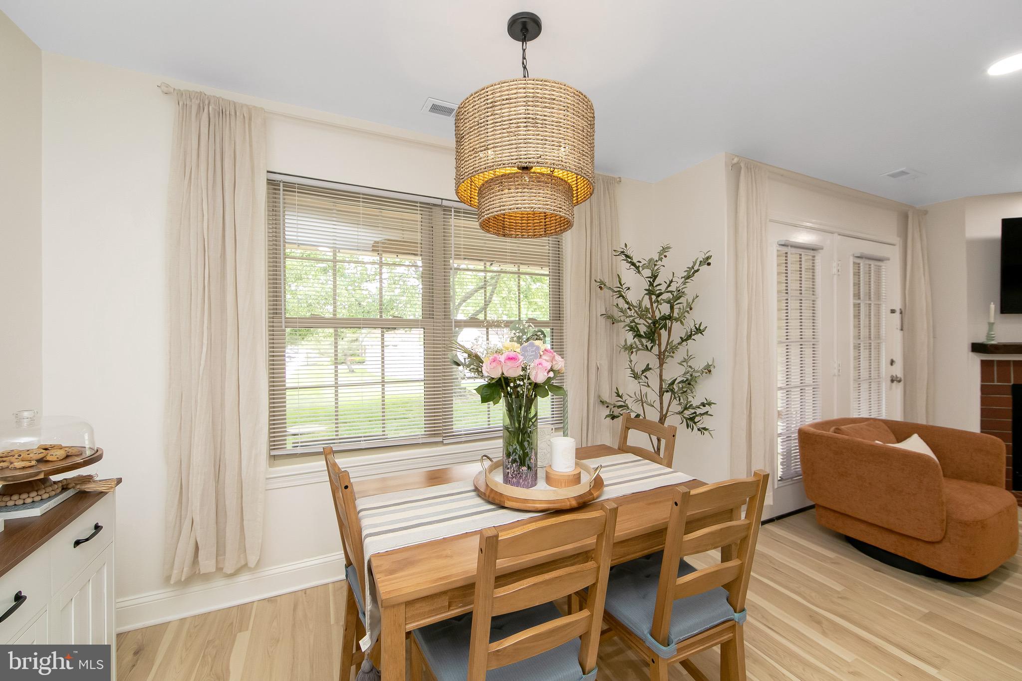 166 Tavistock Cherry Hill, NJ 08034 - Photo 13 of 38 a view of a dining room with furniture window and wooden floor