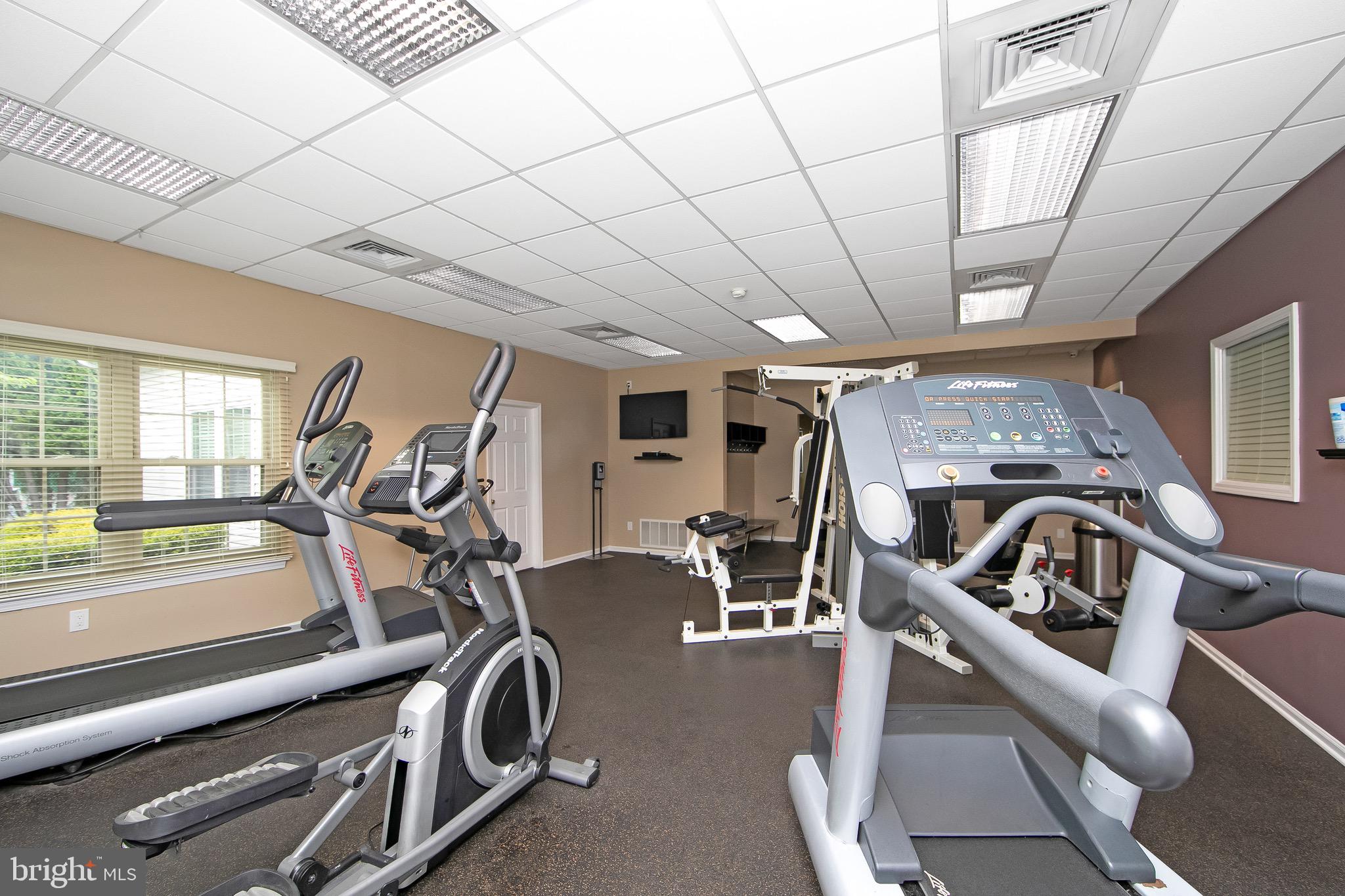 166 Tavistock Cherry Hill, NJ 08034 - Photo 28 of 38 a view of a room with gym equipment
