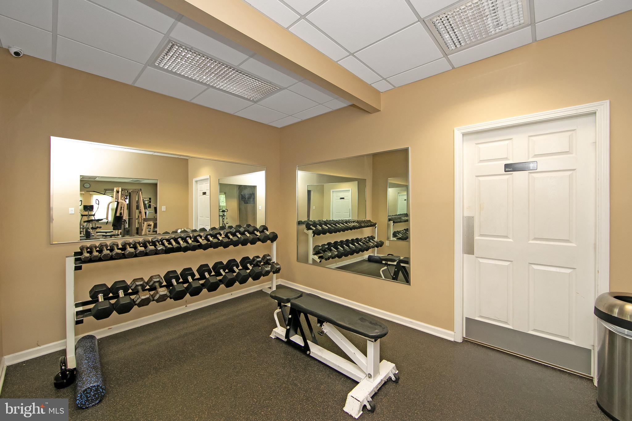 166 Tavistock Cherry Hill, NJ 08034 - Photo 29 of 38 a room with gym equipment