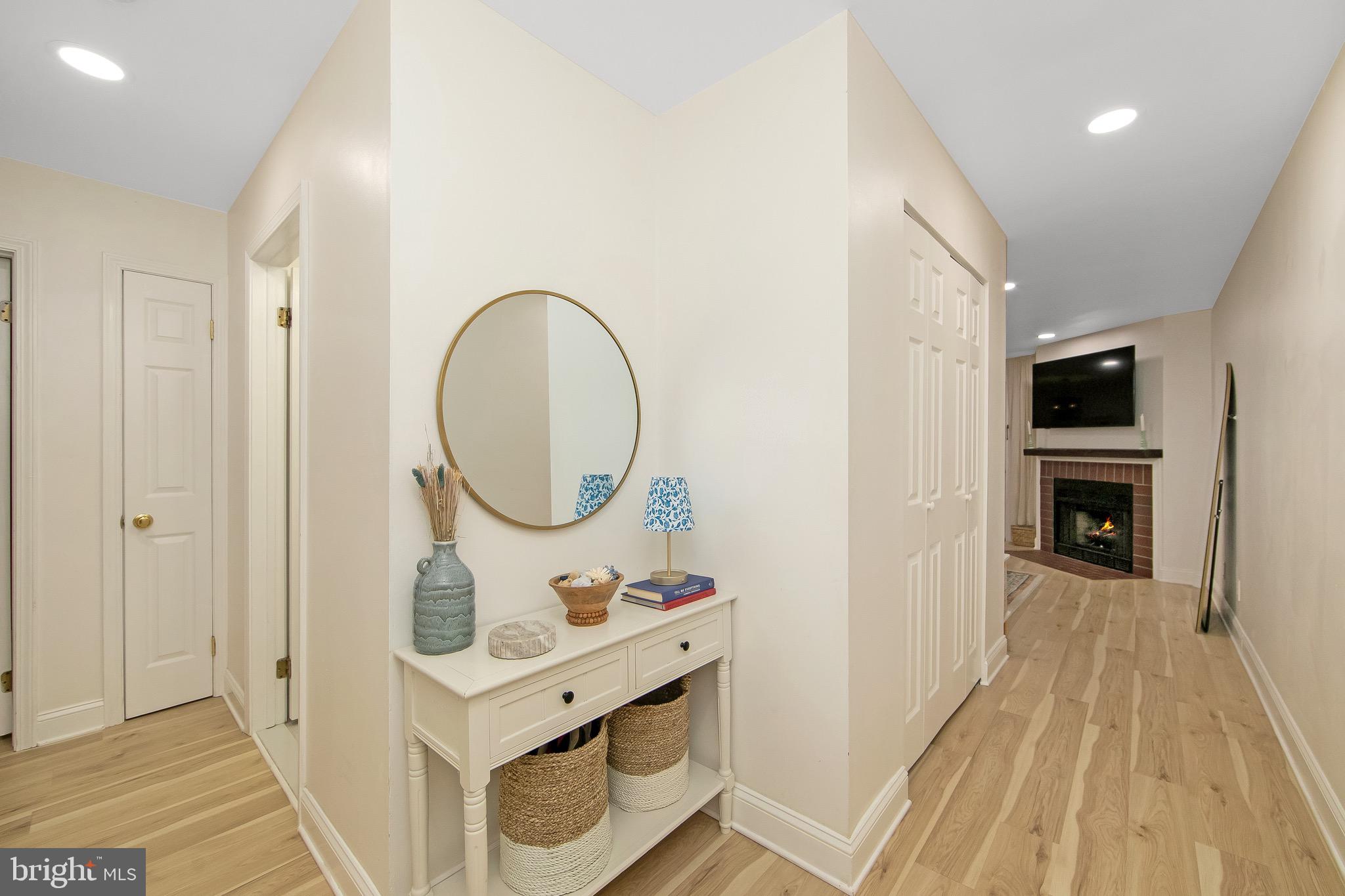 166 Tavistock Cherry Hill, NJ 08034 - Photo 3 of 38 a view of living room with furniture and a fireplace