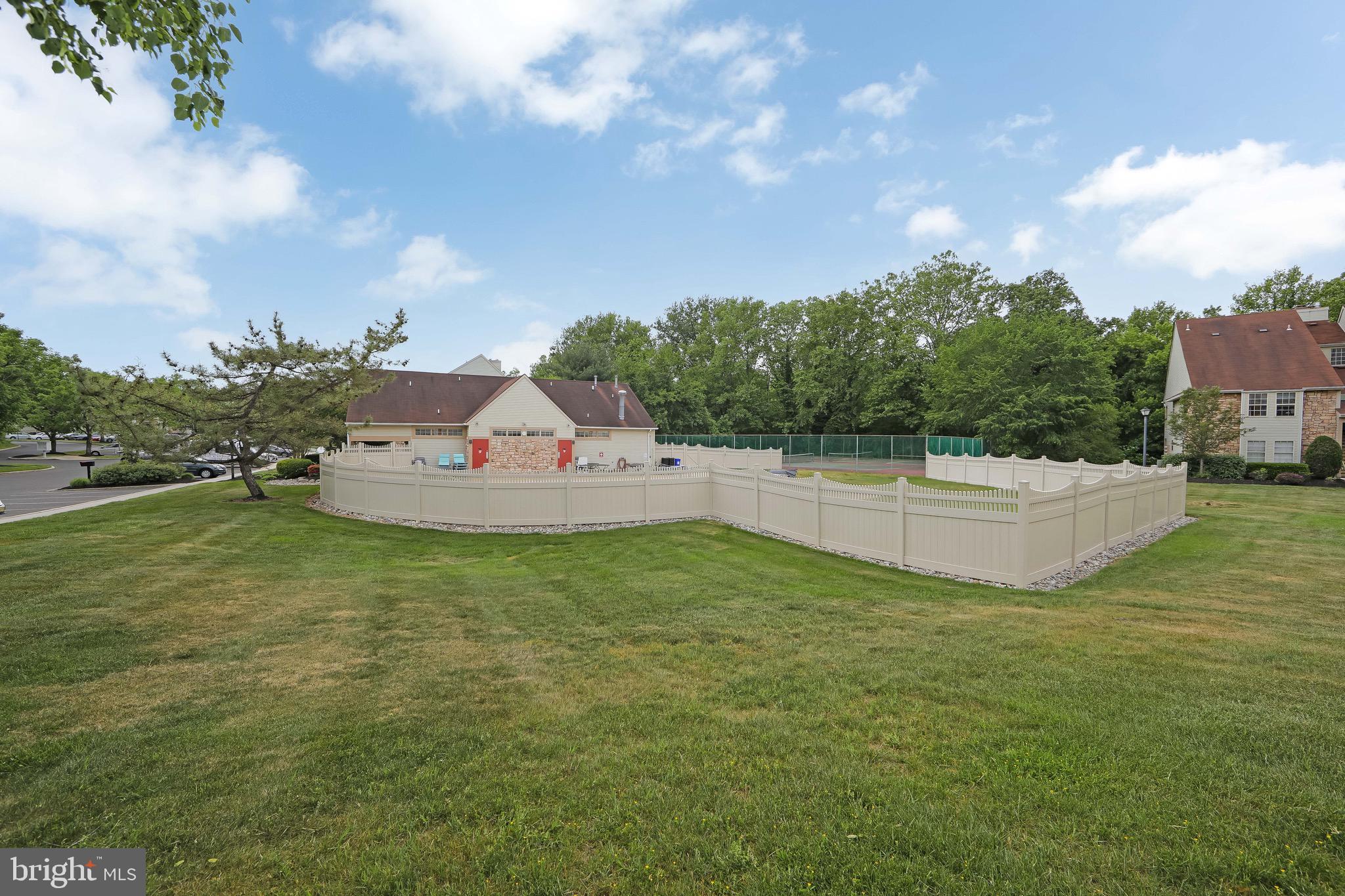 166 Tavistock Cherry Hill, NJ 08034 - Photo 33 of 38 a view of a garden and basketball court