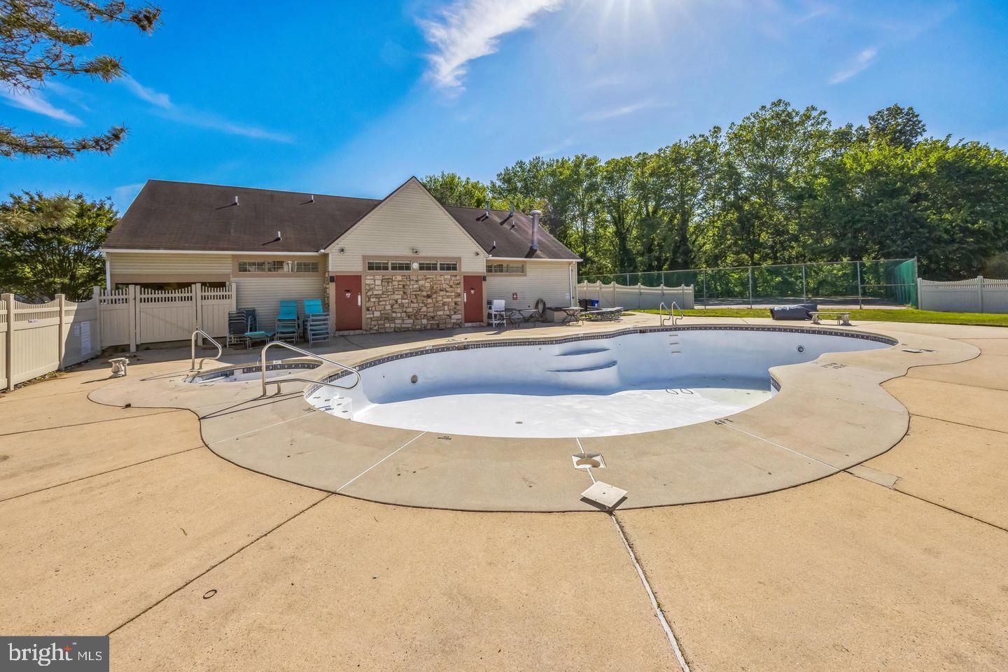 166 Tavistock Cherry Hill, NJ 08034 - Photo 34 of 38 a view of a house with swimming pool and sitting area