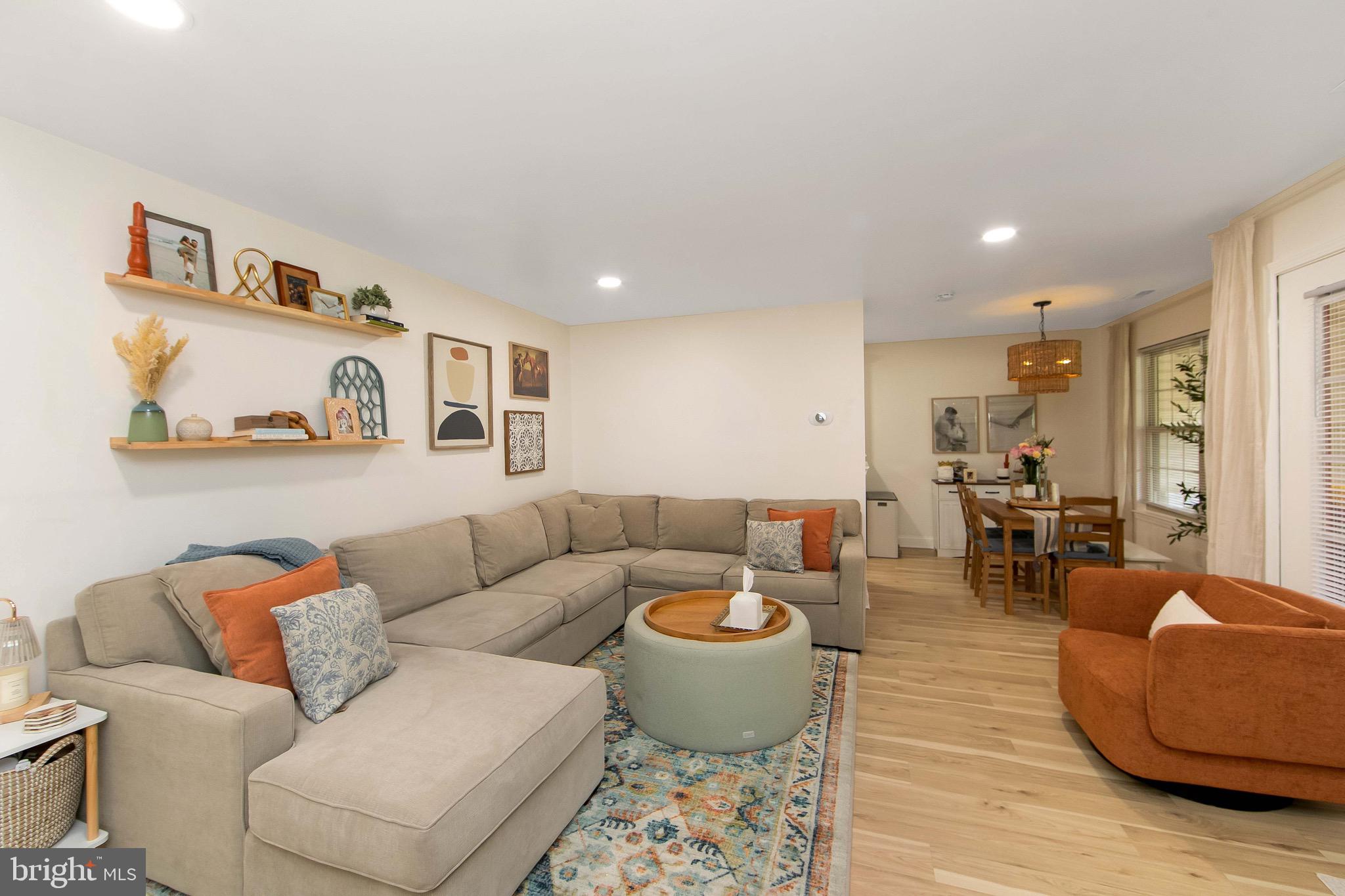 166 Tavistock Cherry Hill, NJ 08034 - Photo 6 of 38 a living room with furniture and wooden floor