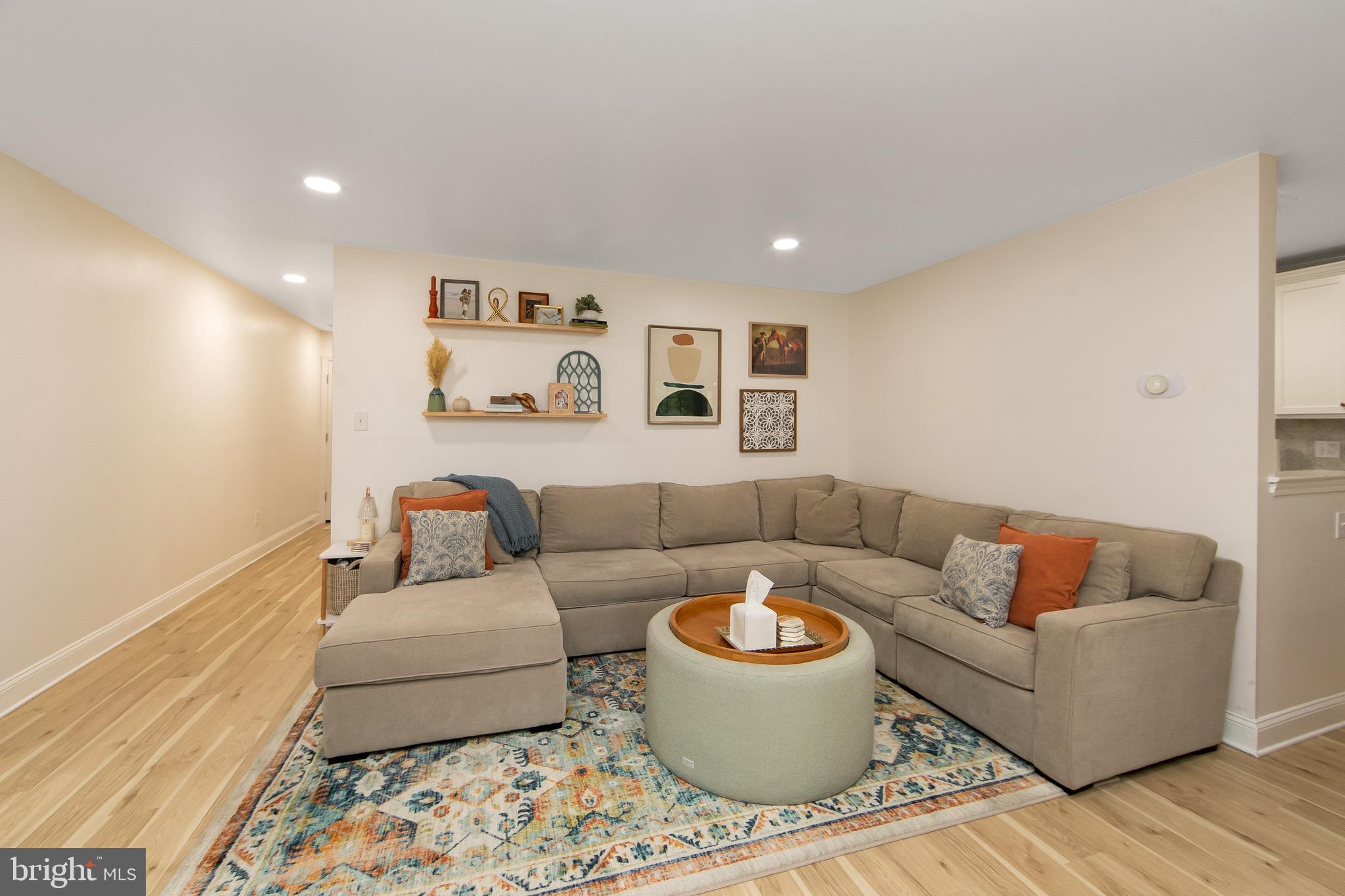 166 Tavistock Cherry Hill, NJ 08034 - Photo 7 of 38 a living room with furniture and a couch