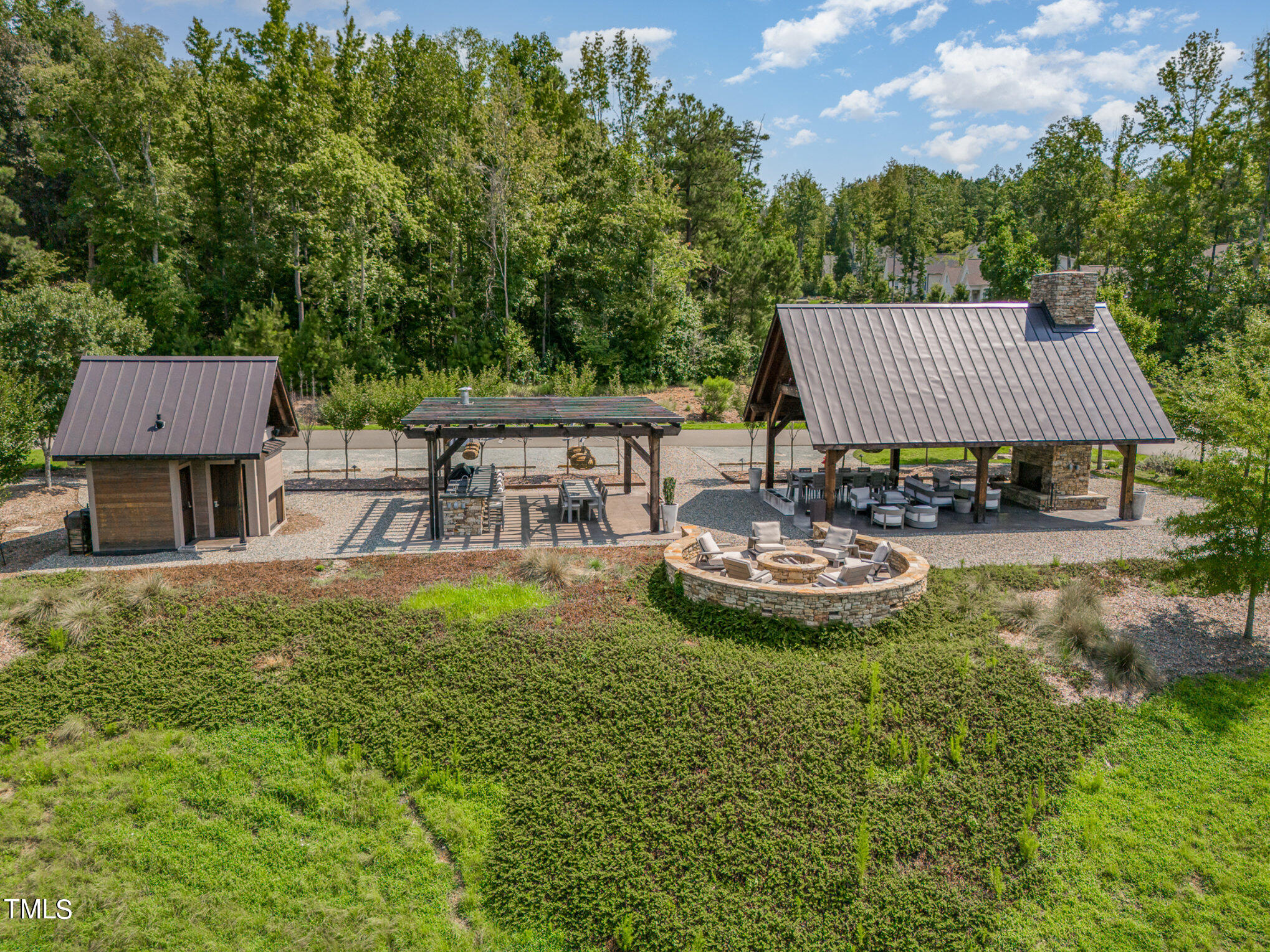 222 Kenwood Lane Pittsboro, NC 27312 - Photo 8 of 24 a view of a house with backyard and sitting area