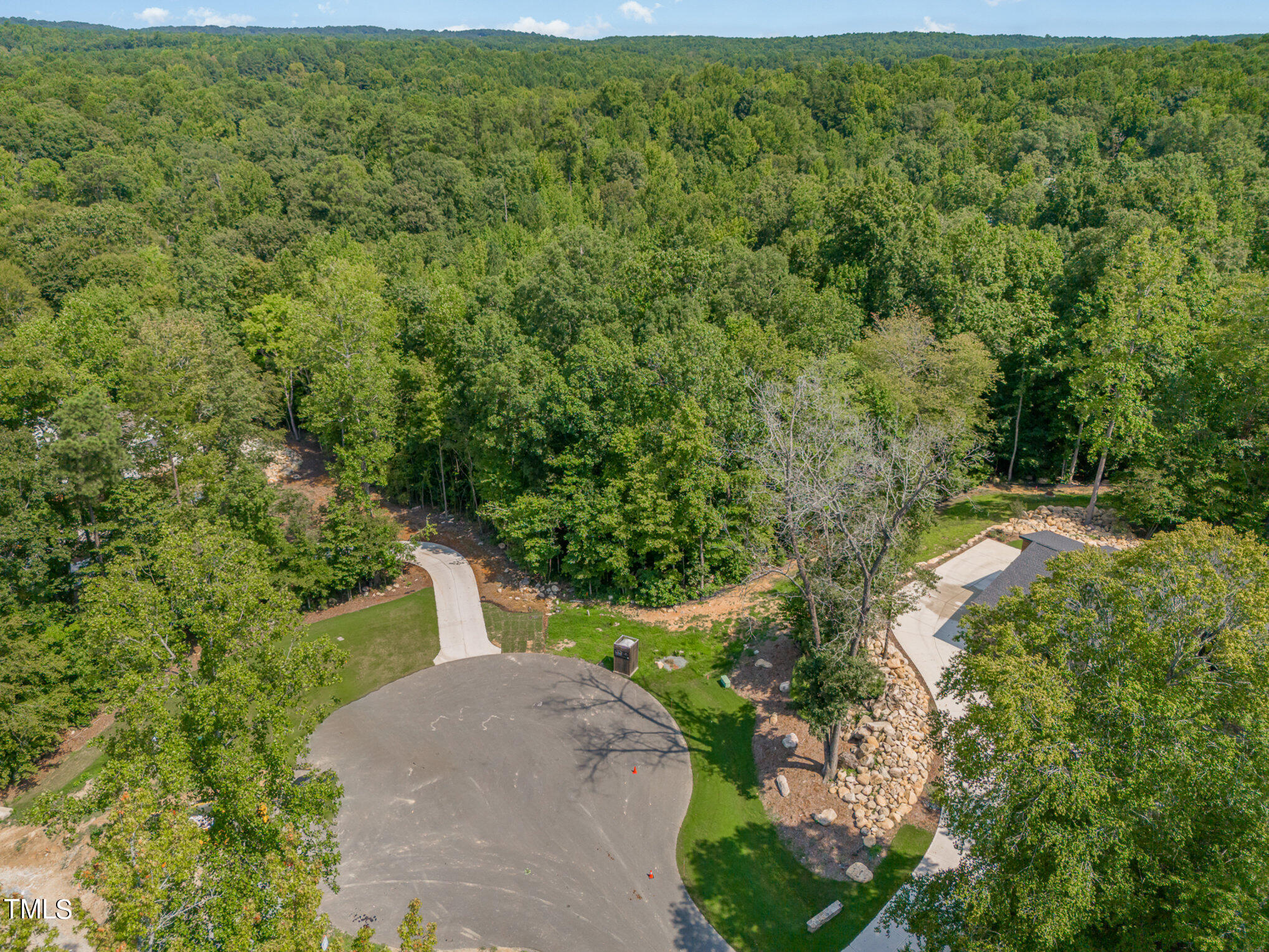 222 Kenwood Lane Pittsboro, NC 27312 - Photo 21 of 24 a view of a garden with trees
