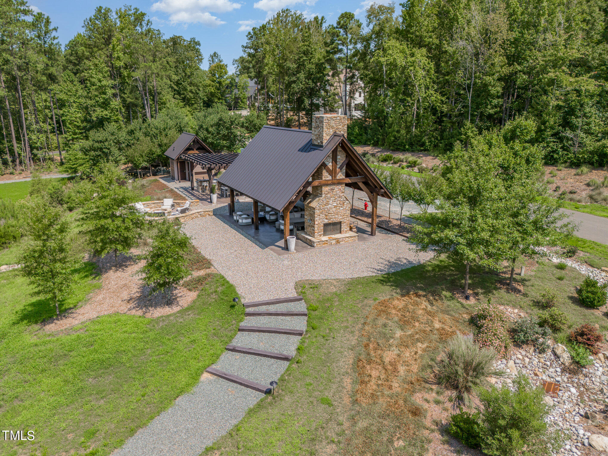 222 Kenwood Lane Pittsboro, NC 27312 - Photo 7 of 24 a view of a backyard with sitting area