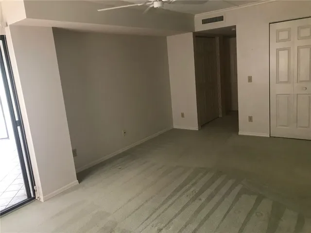 an empty room with closet
