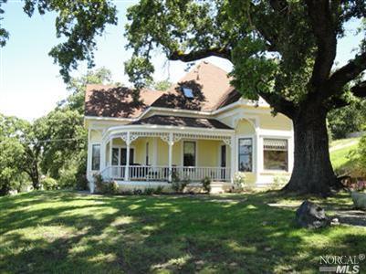 28520 River Road Cloverdale, CA 95425 - Photo 1 of 1 Coming up the driveway the house is viewed with its wide porch and intricate detail under the roofline and on the railing. There is plenty of room for several people to sit and enjoy the westerly views from this porch.