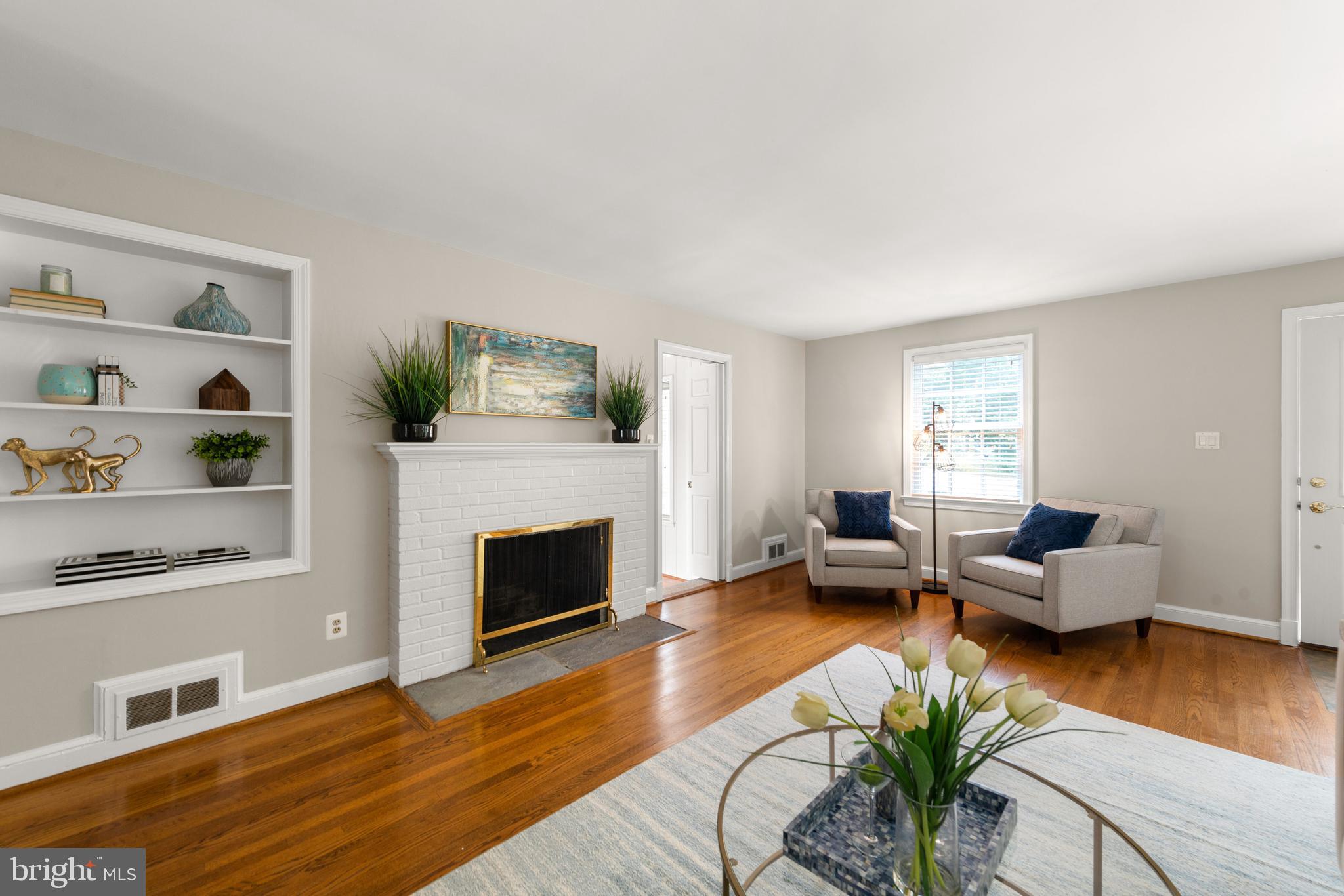 6484 Little Falls Road Arlington, VA 22213 - Photo 22 of 74 Cute built ins, fireplace and sunlight