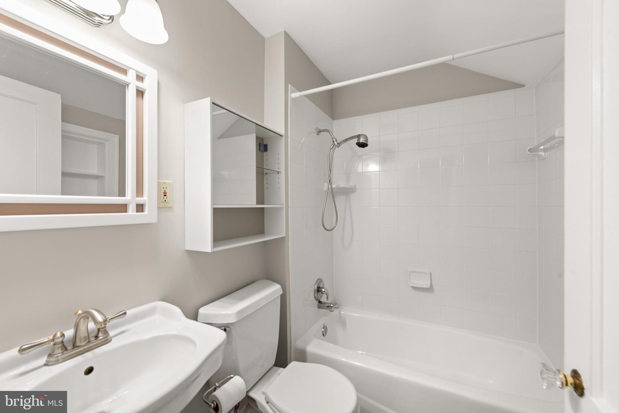 6484 Little Falls Road Arlington, VA 22213 - Photo 62 of 74 Hall bath is white and clean