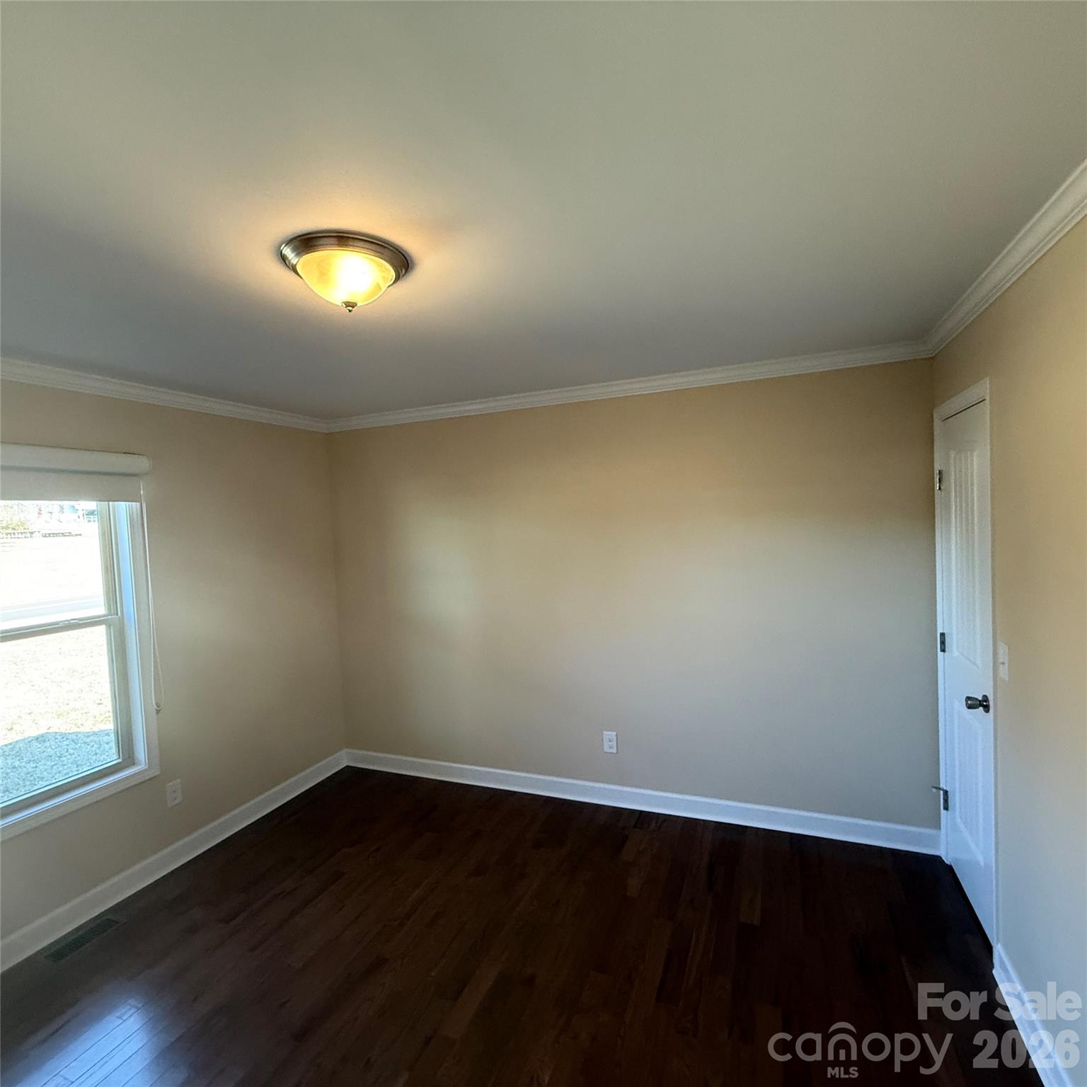 3523 Icard Rhodhiss Road Connelly Springs, NC 28612 - Photo 21 of 28 an empty room with wooden floor and windows