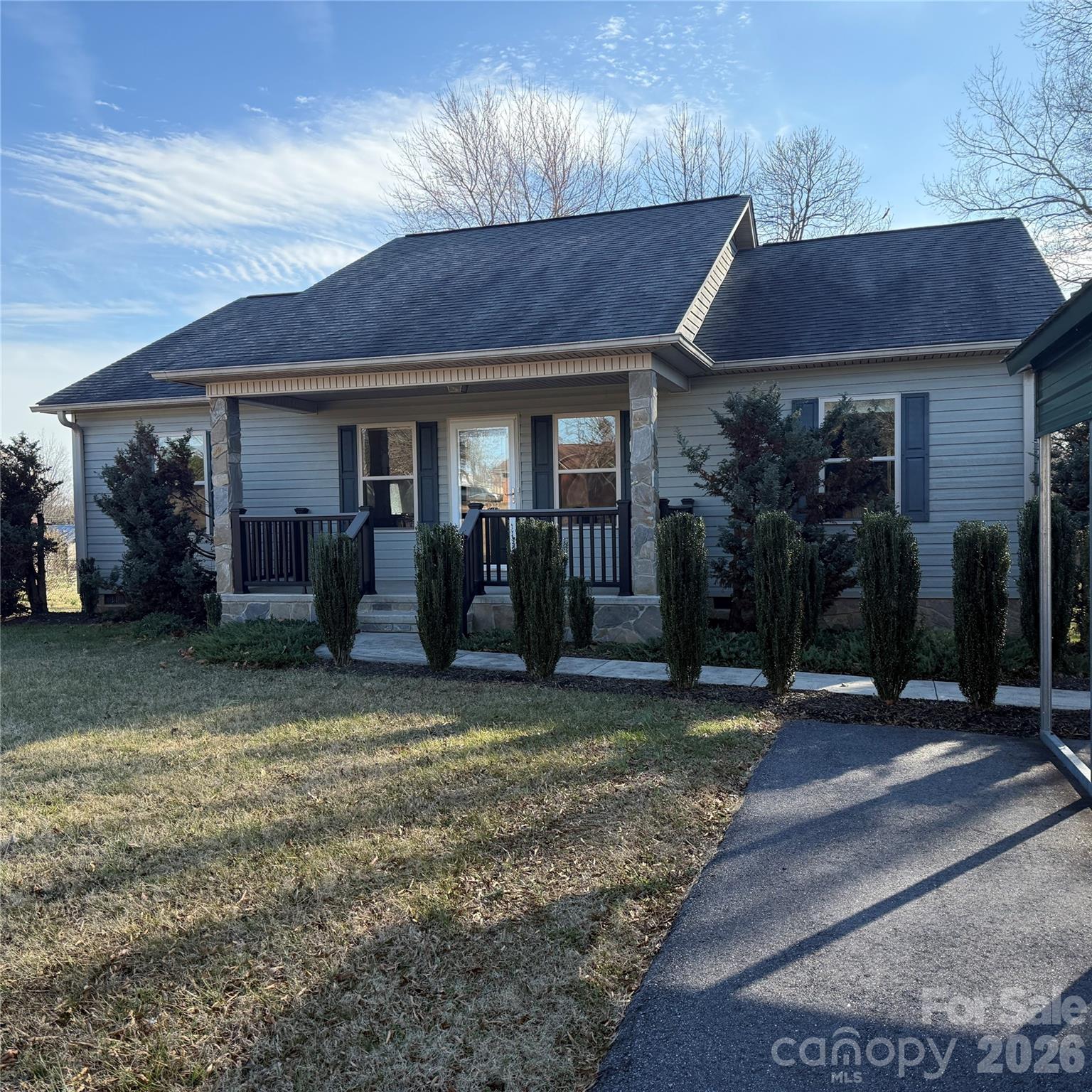 3523 Icard Rhodhiss Road Connelly Springs, NC 28612 - Photo 26 of 28 a front view of a house with a yard and garage