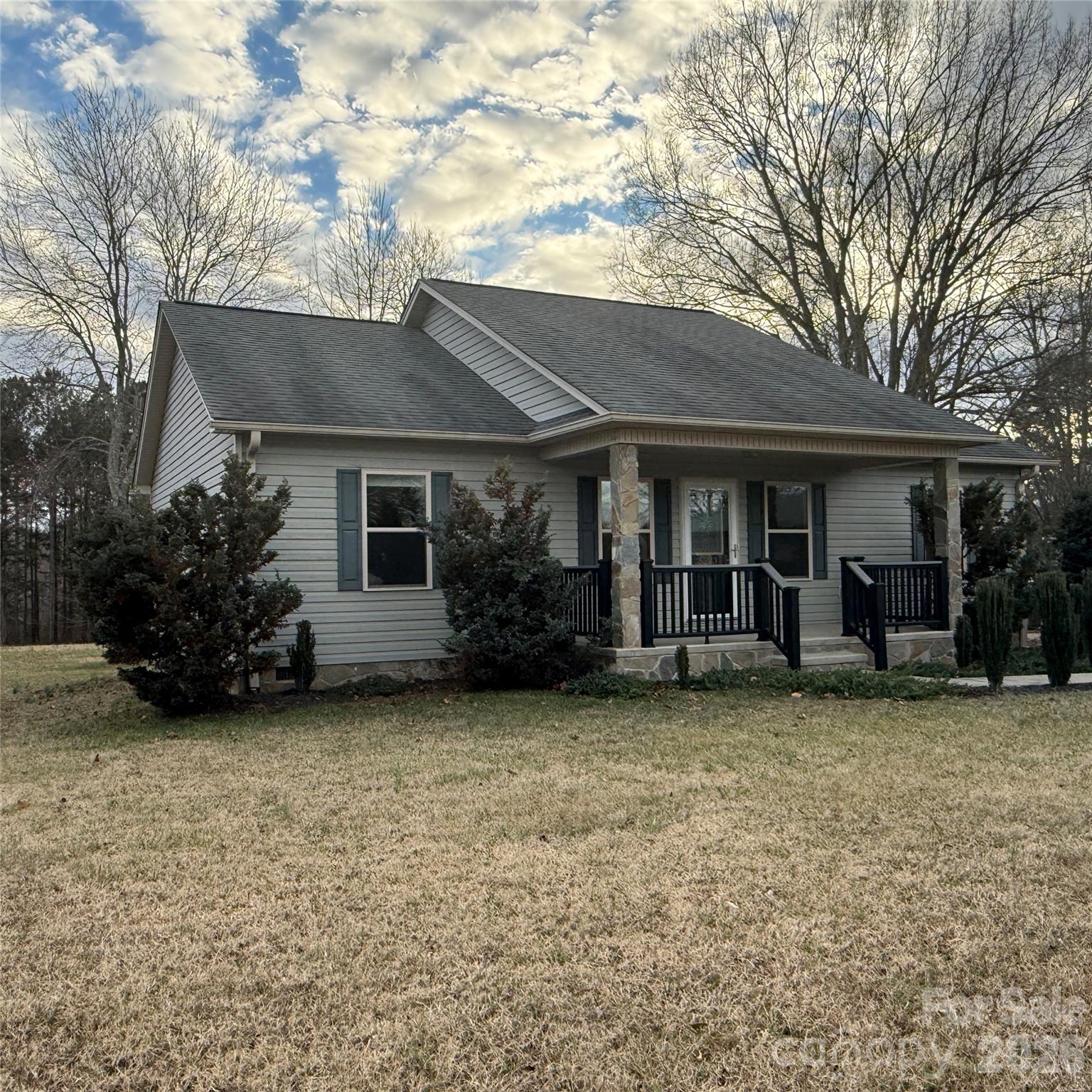 3523 Icard Rhodhiss Road Connelly Springs, NC 28612 - Photo 28 of 28 a view of a house with a yard and large tree