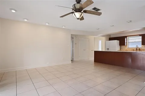 a view of a kitchen with a sink