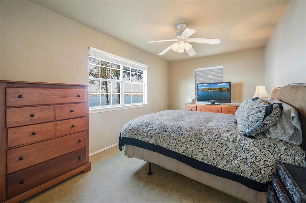 236 County Road 1422 Quitman, TX 75783 - Photo 15 of 34 Bedroom featuring baseboards and a ceiling fan
