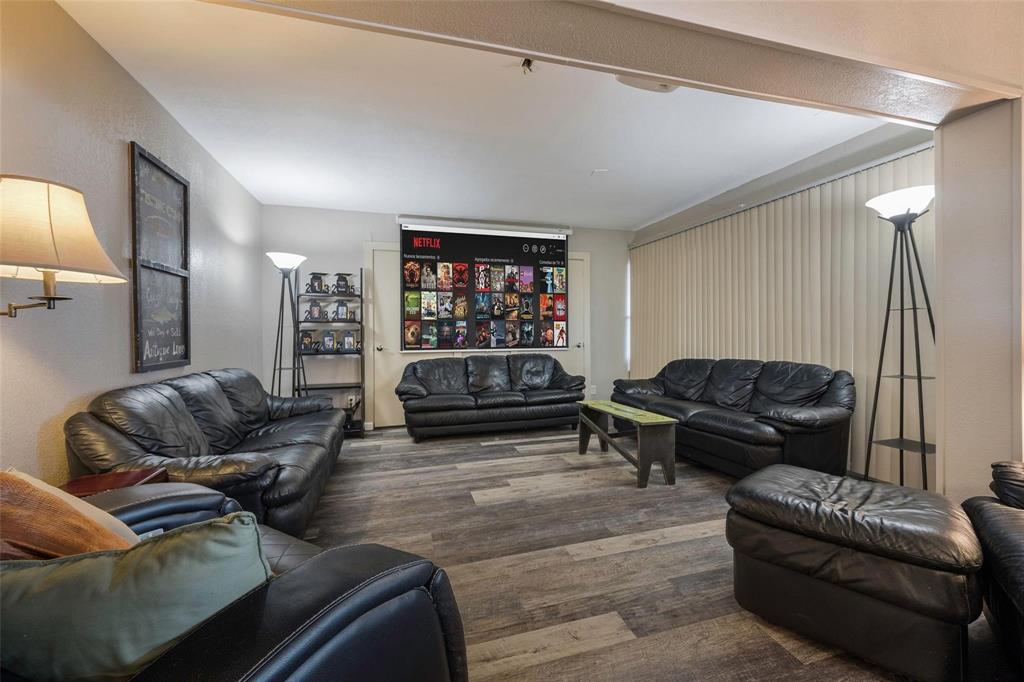 236 County Road 1422 Quitman, TX 75783 - Photo 19 of 34 Living area with wood finished floors