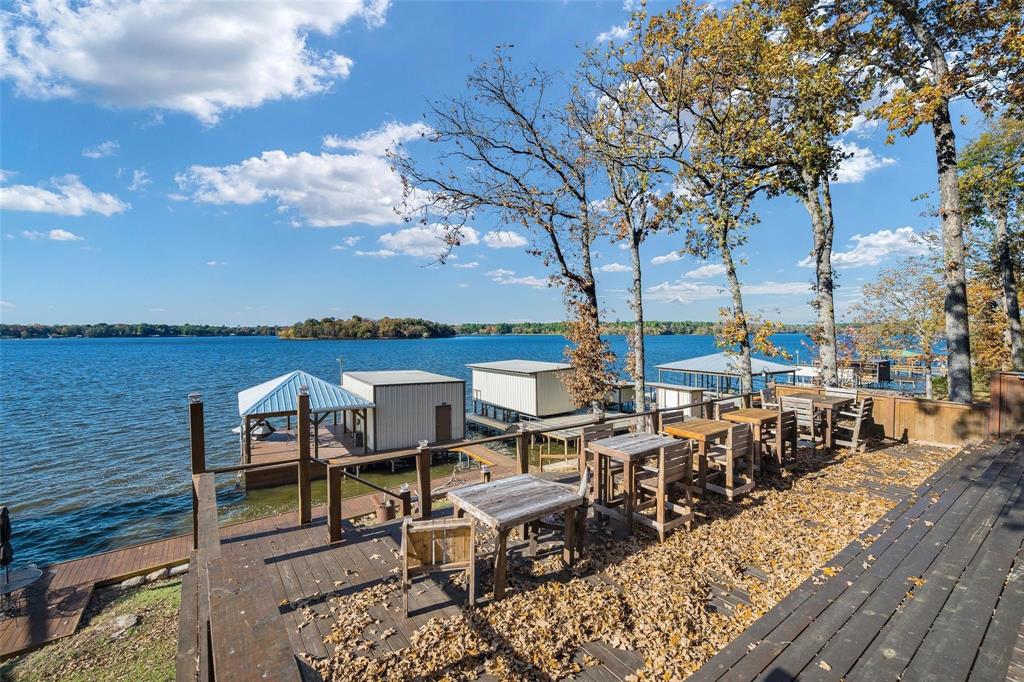 236 County Road 1422 Quitman, TX 75783 - Photo 25 of 34 View of dock featuring a water view and boat lift
