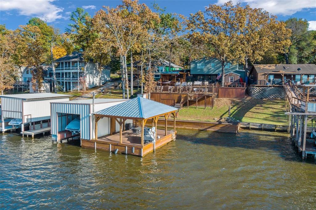 236 County Road 1422 Quitman, TX 75783 - Photo 31 of 34 View of dock featuring a water view and boat lift