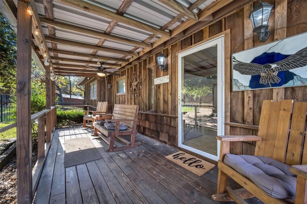 236 County Road 1422 Quitman, TX 75783 - Photo 4 of 34 Wooden deck featuring ceiling fan