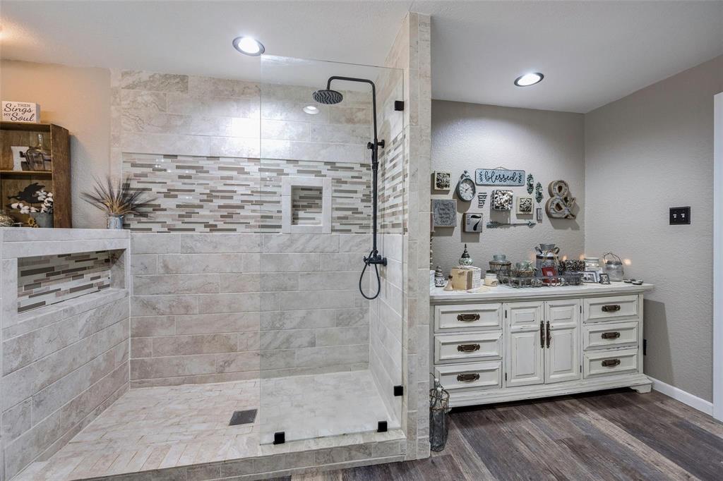 236 County Road 1422 Quitman, TX 75783 - Photo 8 of 34 Full bath featuring recessed lighting, walk in shower, vanity, and wood finished floors