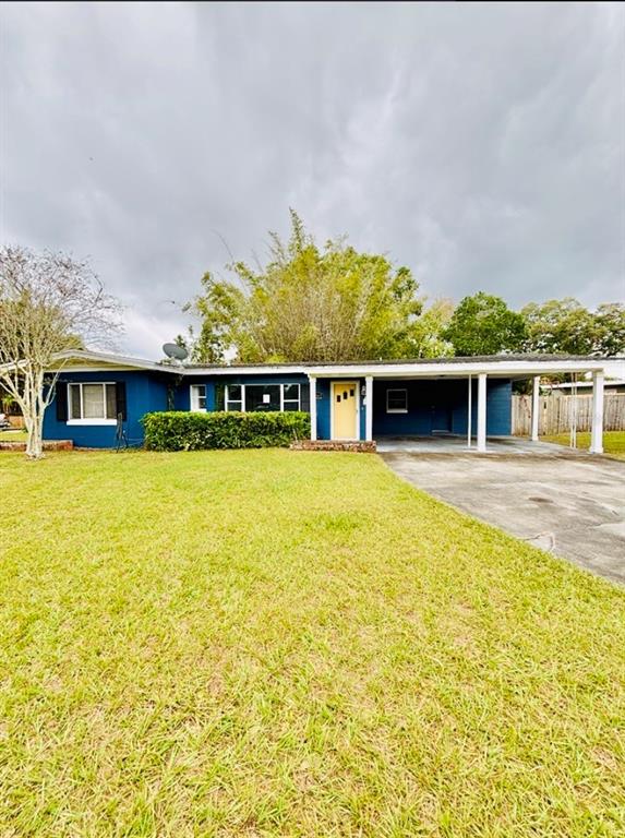 1202 Berwyn Road Orlando, FL 32806 - Photo 1 of 3 a view of house with swimming pool