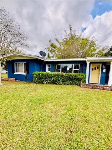 a view of a house with a swimming pool
