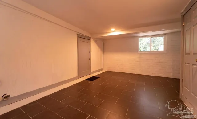 a swimming pool with outdoor seating and yard