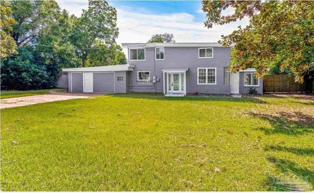 a view of a house with a swimming pool