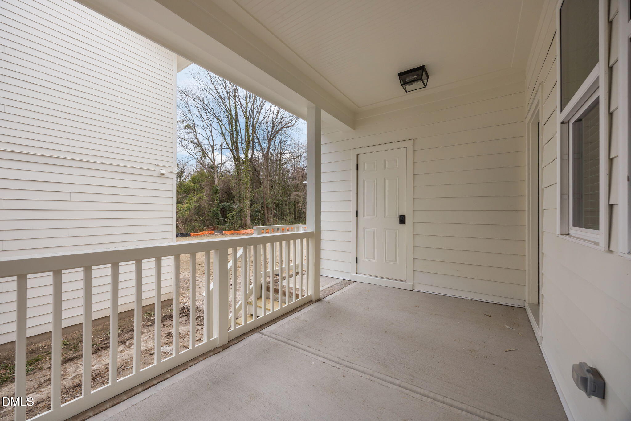 2811 Wilcox Place, Unit 101 Raleigh, NC 27607 - Photo 11 of 29 a view of a porch with wooden floor