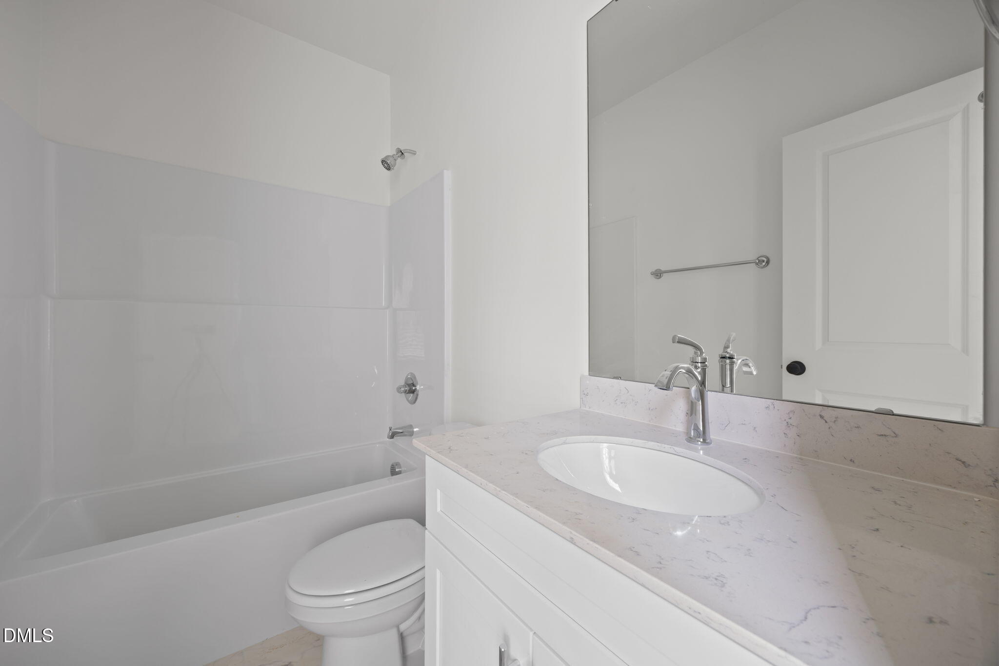 2811 Wilcox Place, Unit 101 Raleigh, NC 27607 - Photo 13 of 29 a bathroom with a granite countertop sink a toilet and shower