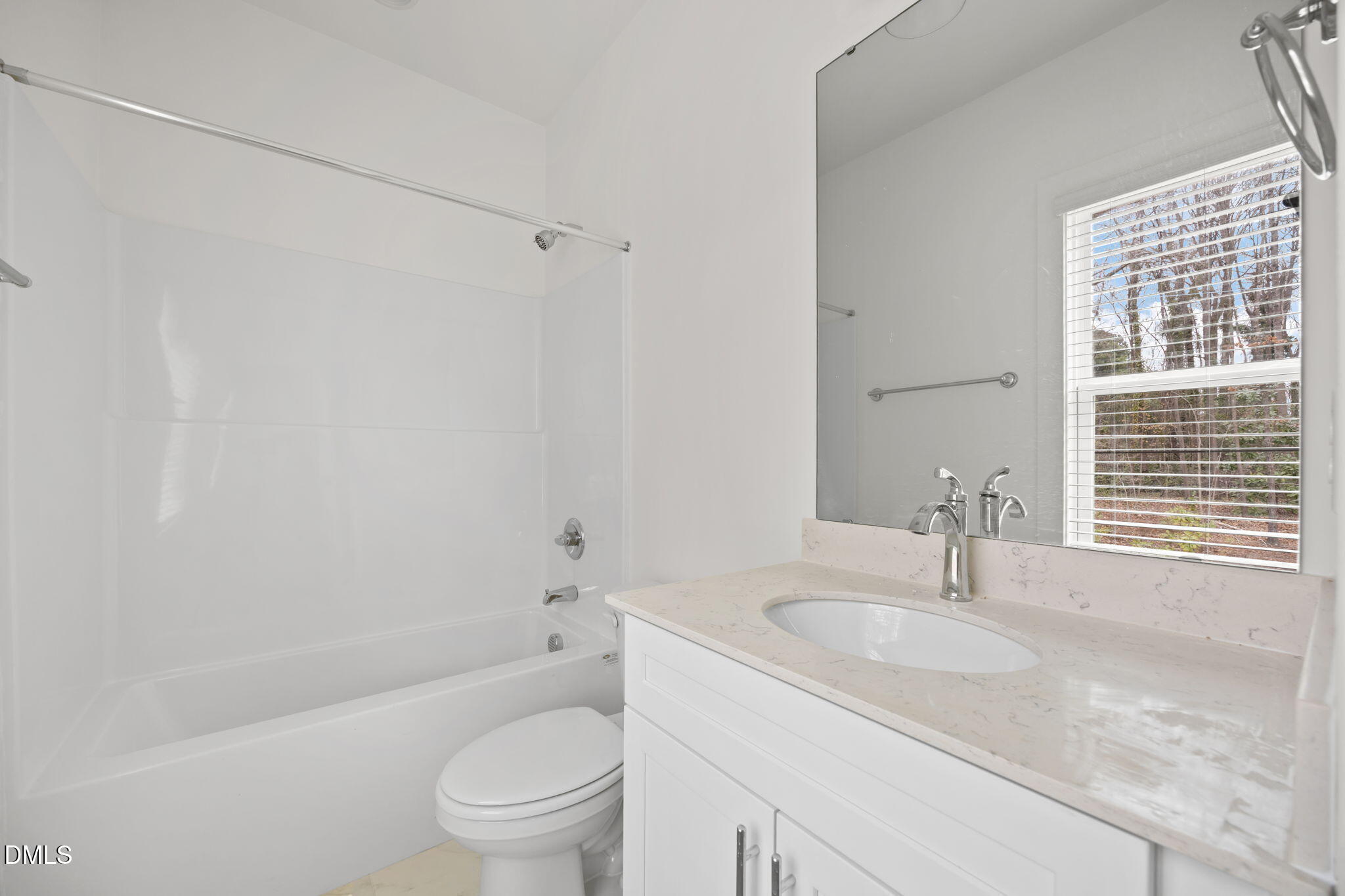 2811 Wilcox Place, Unit 101 Raleigh, NC 27607 - Photo 2 of 29 a bathroom with a granite countertop sink a toilet and shower