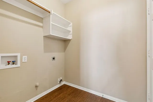 a view of a small space with wooden floor