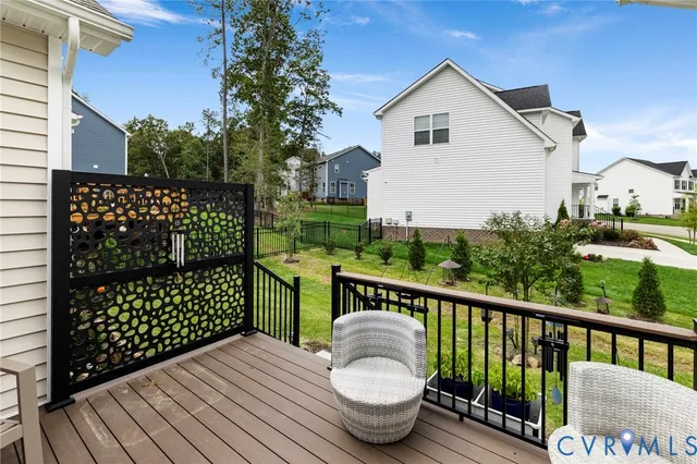 a balcony with wooden floor