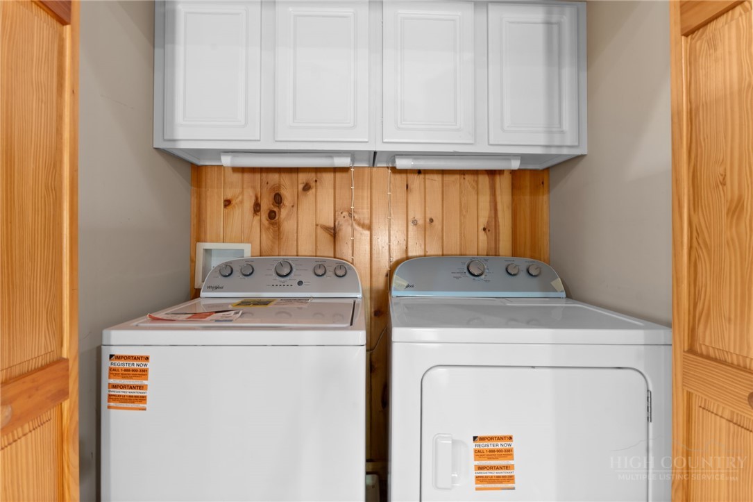 148 Woodby Ridge Road Vilas, NC 28692 - Photo 11 of 33 a utility room with dryer and washer
