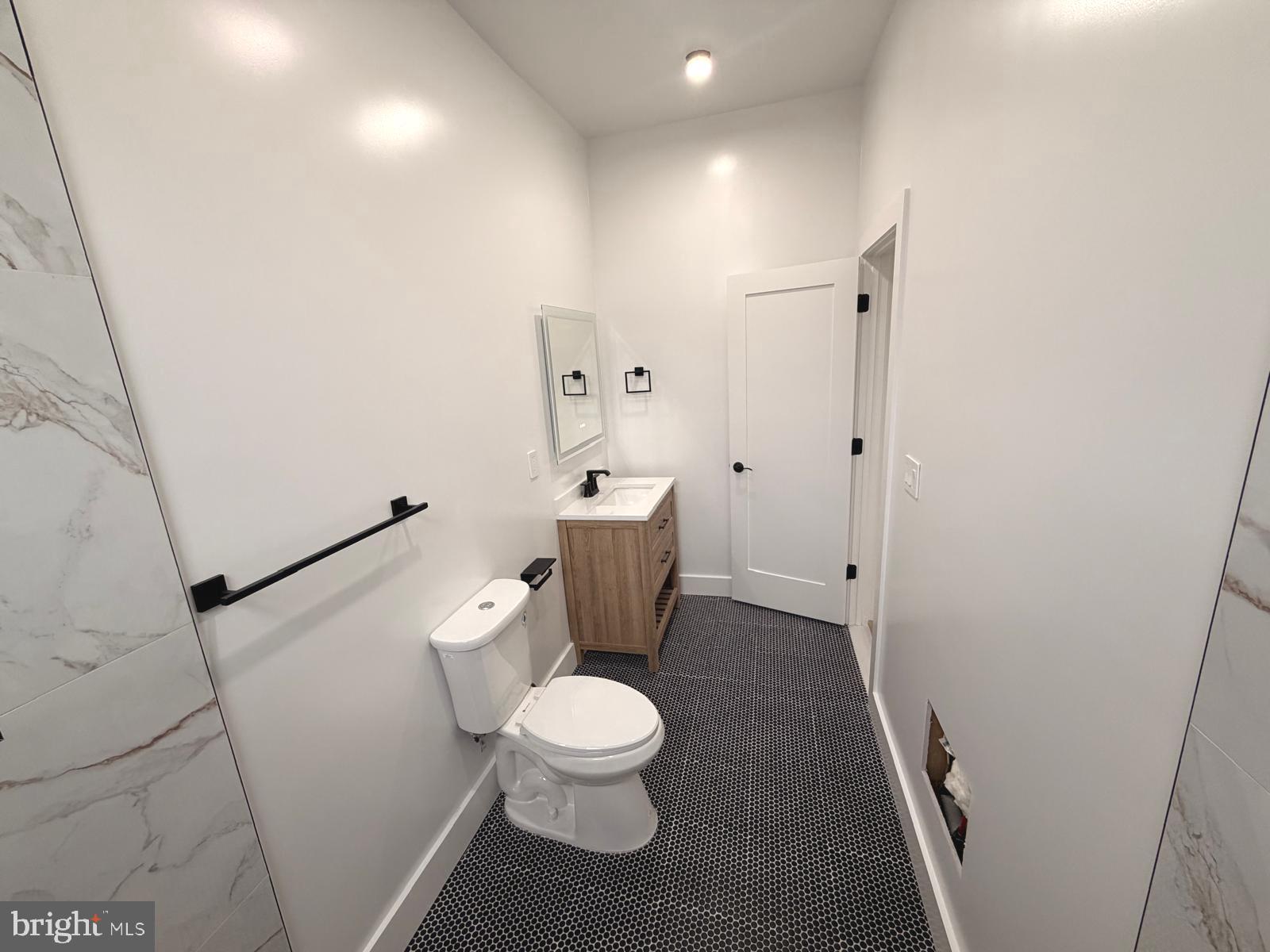 230 North 9th Street Reading, PA 19601 - Photo 9 of 20 a bathroom with a toilet and a shower