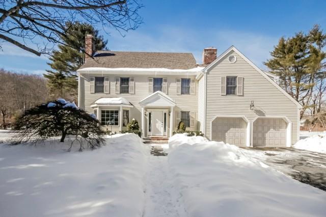 553 Danbury Road Wilton, CT 06897 - Photo 1 of 1 a view of a white house with large trees and wooden fence