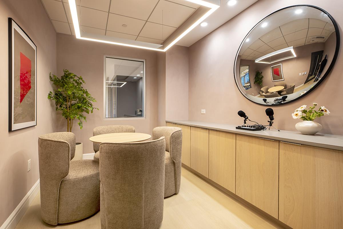 1440 Amsterdam Avenue, Unit 2022 Manhattan, NY 10027 - Photo 16 of 25 a living room with a couch and a potted plant