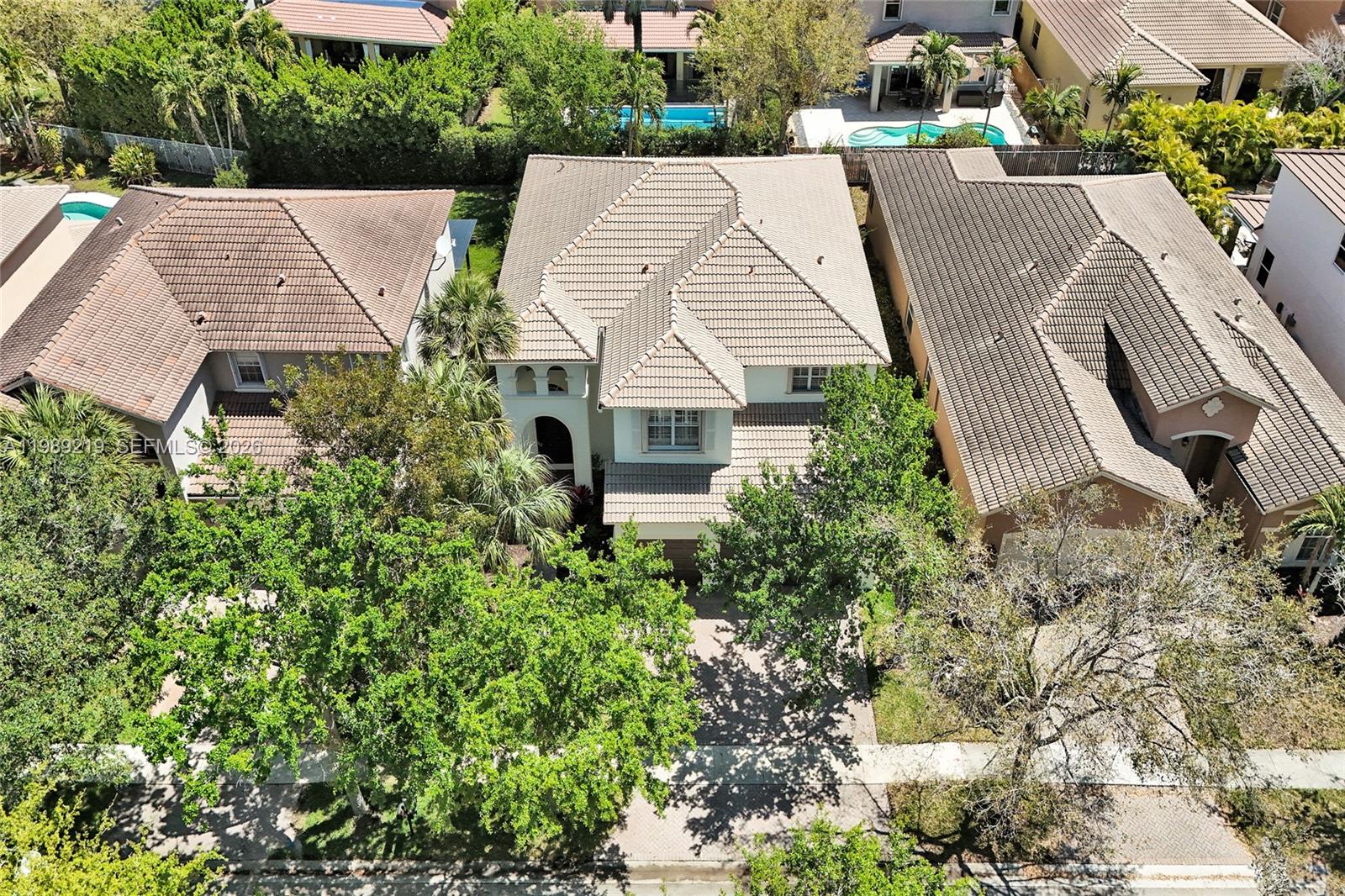 3936 Cascade Terrace Weston, FL 33332 - Photo 3 of 90 an aerial view of a house with garden space and street view