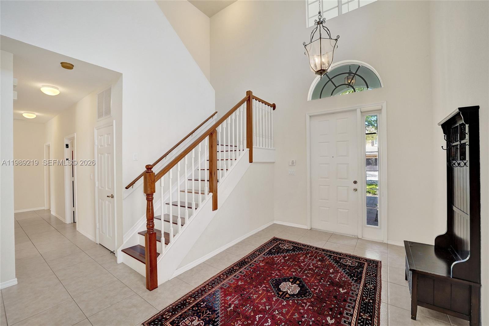 3936 Cascade Terrace Weston, FL 33332 - Photo 38 of 90 a view of entryway and hall with a rug