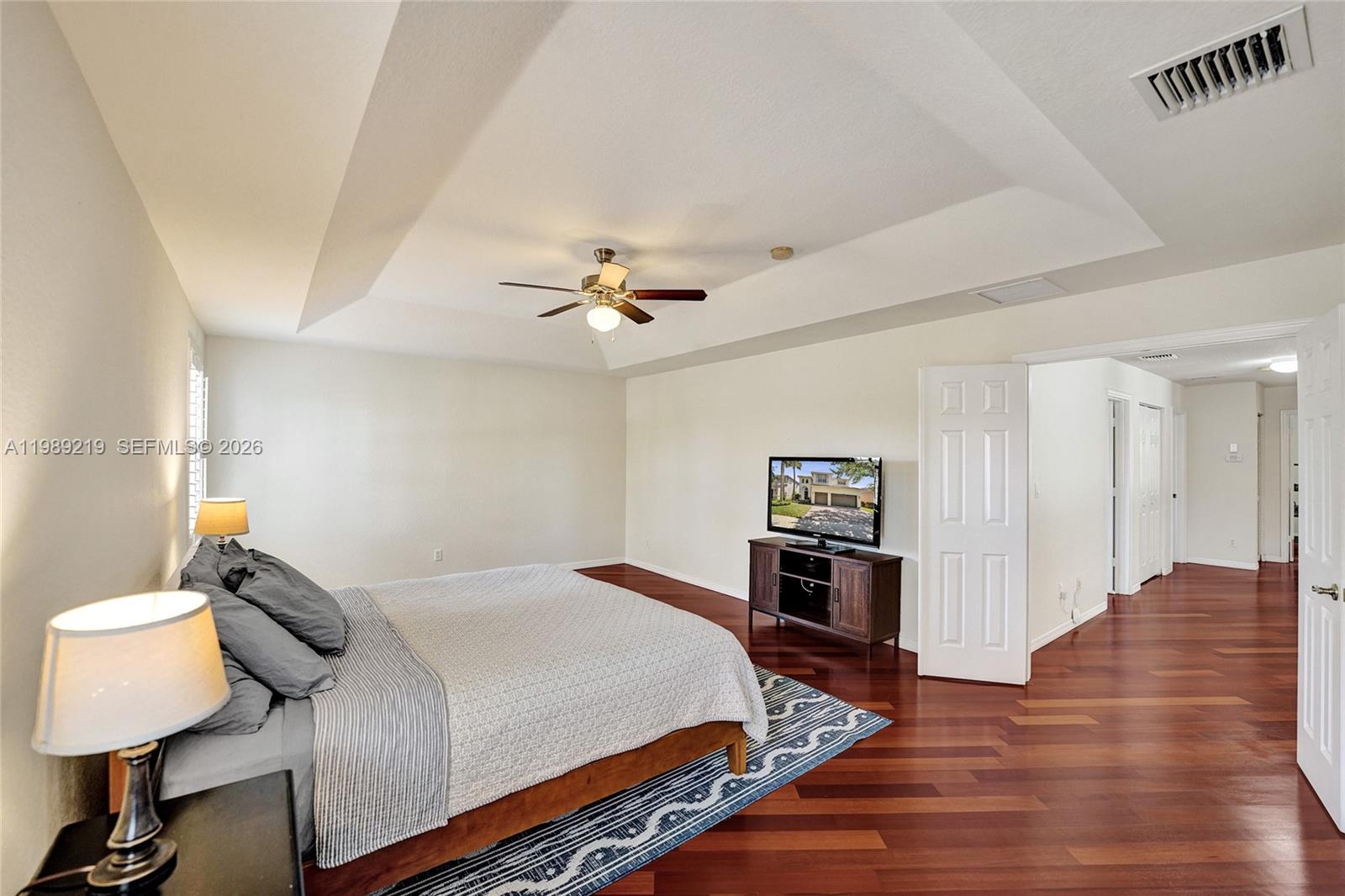 3936 Cascade Terrace Weston, FL 33332 - Photo 45 of 90 a bed room with a bed and dresser
