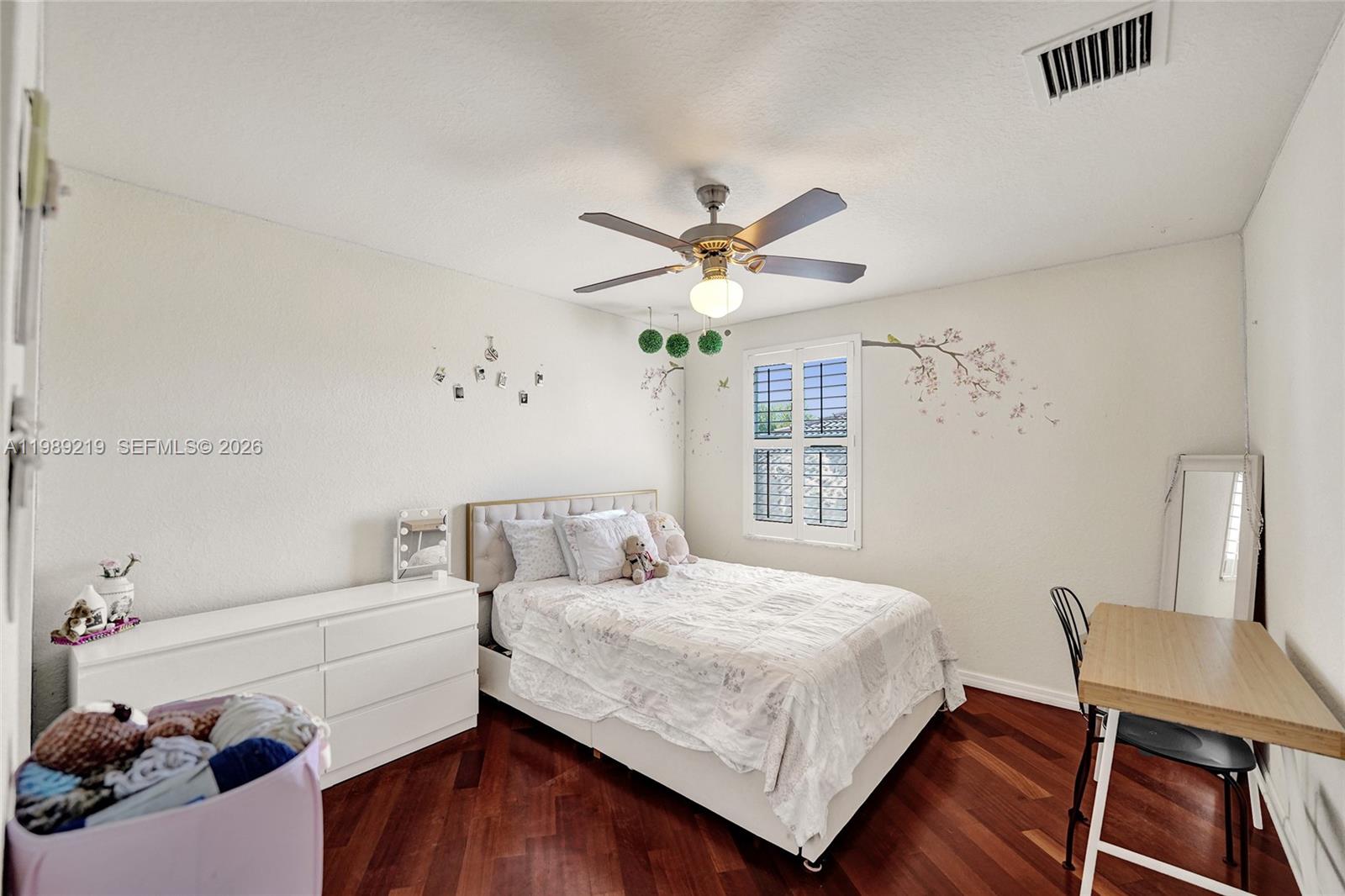 3936 Cascade Terrace Weston, FL 33332 - Photo 53 of 90 a bedroom with a bed and a chandelier